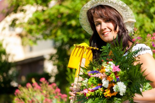 Seasonal gardening work in an Earlsfield property with plants and hedge care